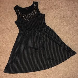 Black dress with metallic stripes